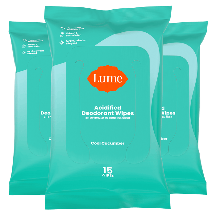 Three green packs of 15 count wipes overlapping