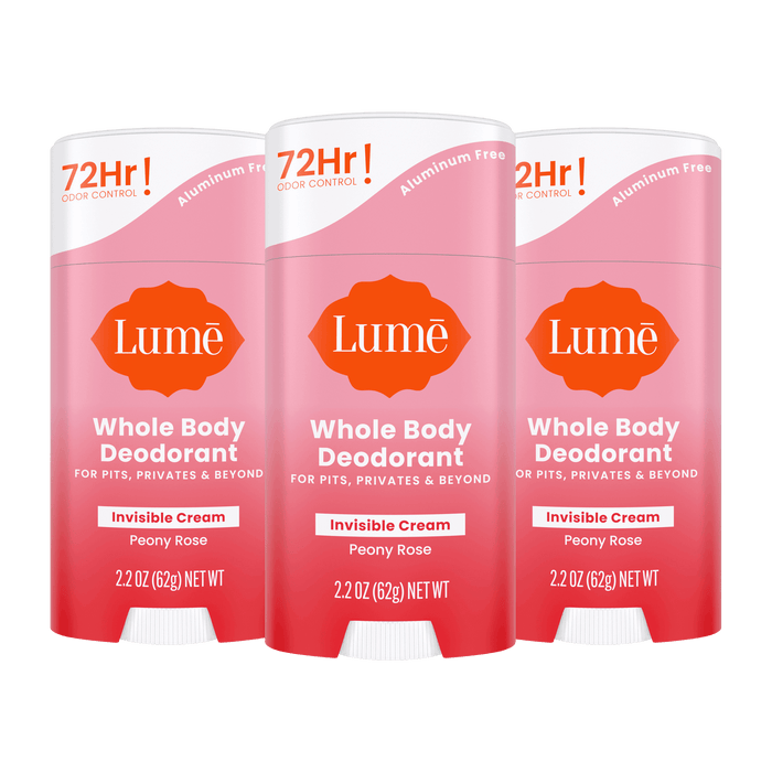 Three pink Lume cream deodorant sticks in the scent Peony Rose