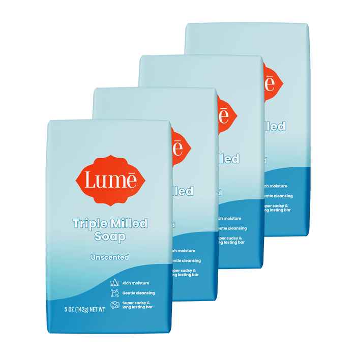 Four overlapping bars of unscented soap